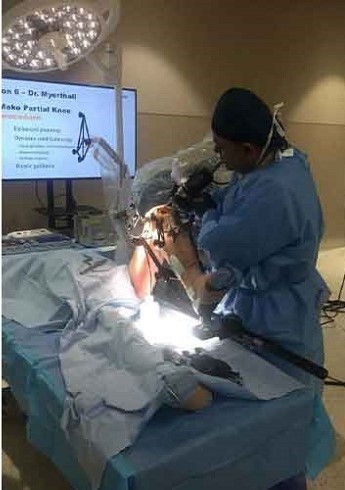 Dr. Ashish Singh the Orthopedic Robotic surgeon performing Orthopedic Robotic Surgery
